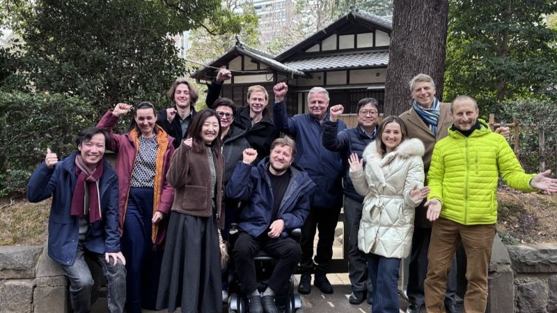 Research team gathered at traditional Japanese building during Tokyo project kickoff